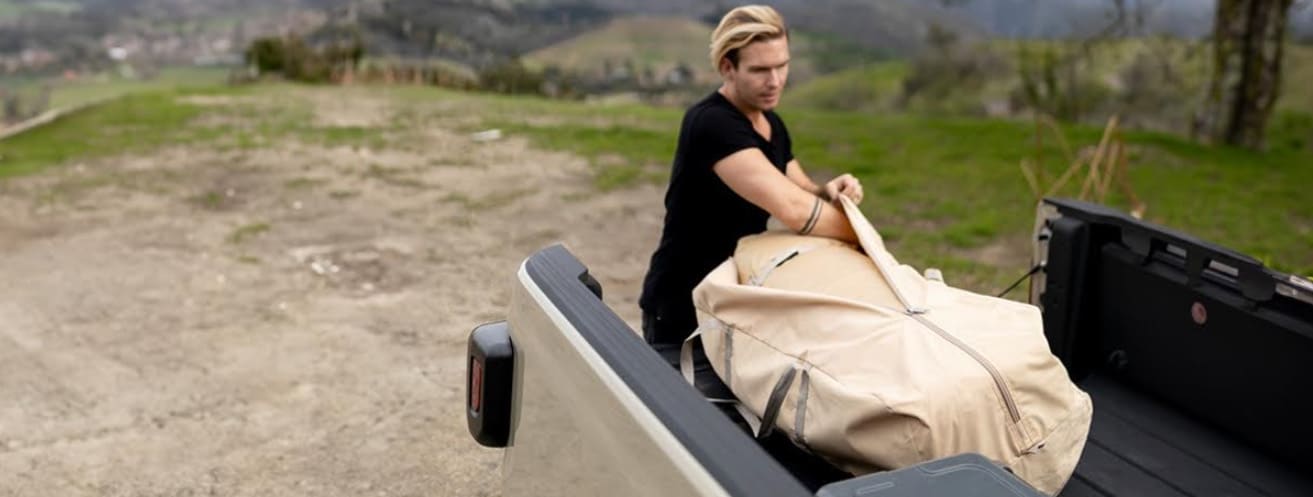 Packing tent in storage bag